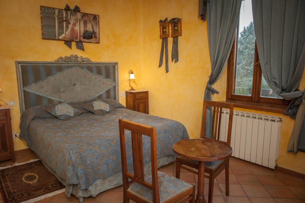 Апартаменты Residenza Il Palazzo Кастильоне-дель-Лаго Номер фото