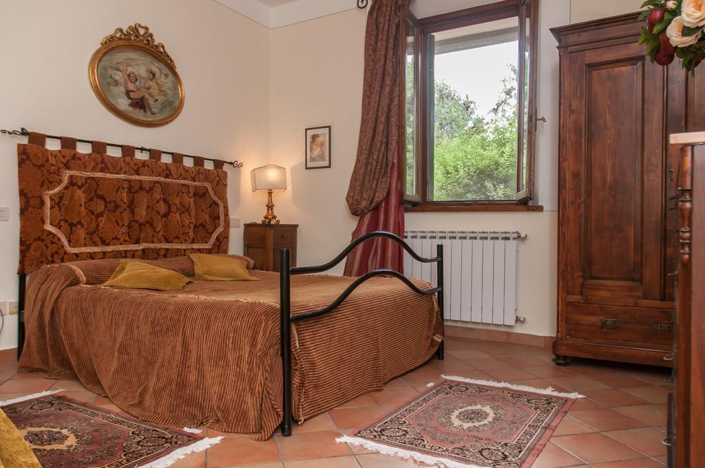 Апартаменты Residenza Il Palazzo Кастильоне-дель-Лаго Номер фото